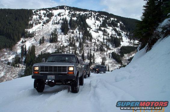 dcp_0180.jpg Scott packing the trail down with his big 33's