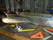 1992 Ford Bronco - Metal parts are laid out on a workbench with various tools for fabrication.