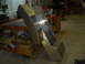 1992 Ford Bronco - A custom metal fabrication project is shown on a workbench in a workshop setting.