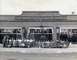 1909 Ford Model T - A group poses outside the A.M. Smith Universal Car Agency, a Ford dealership.
