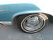 1972 Ford Ranchero - A close-up view of a vehicle's side, focusing on the rear wheel and fender area.