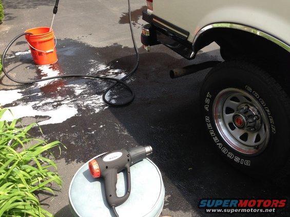 Heat gun to losen the trim from the body panel.  Remember not to overheat one spot.  Keep heater moving and use a plastic scraper to remove trim.