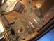 1991 Ford Bronco - The interior floor pan shows significant rust damage and some repair work.