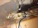 1991 Ford Bronco - Significant rust damage is visible on the floor pan of this 1991 Ford Bronco, affecting structural integrity.