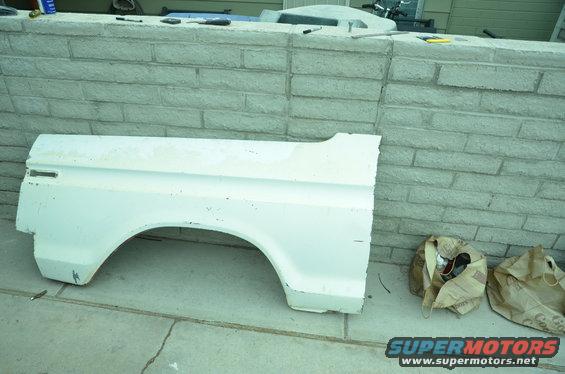 White fender with wheel arch, side view