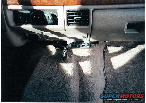 1996 Ford Bronco interior dashboard with CB radio mounted below air vent