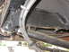 1988 Ford Bronco - Close-up view of the undercarriage, showing hoses and frame components, with a Supermotors.net watermark.