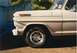 1968 Ford F-100 - A close-up of the front fender and wheel of a vintage Ford F-Series truck.