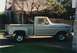 1968 Ford F-100 - This 1968 Ford F-100 pickup truck is shown from the side, parked in a driveway.