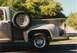 1968 Ford F-100 - This 1968 Ford F-100 pickup truck is seen from the side, its spare tire mounted on the exterior.