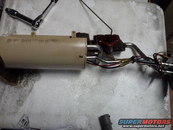 20150104_151916.jpg Got the pump and sender out and as you can tell the pump has been replaced before because of the butt connectors on the red and black wires and the yellow is the sender