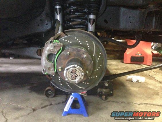 Closeup of completed job.  But you can see my error.  This is another reason to take pics of your work.  I put an extra twist in the brake line when I put the caliper back on.  You can see the pigtail in the line.  When I saw this pic I took the tire off and fixed the caliper.