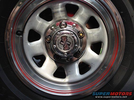 So, with all the upgrades over the first few months I was taking the wheels off over and over and had several of the cheap ass lugs lose their stupid glued-on caps.  Effin ugly!