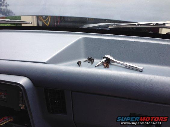 img_2199.jpg OEM radio is held onto the brackets by 4 screws.