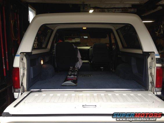 I need storage for my 3 skis.  I want to build a deck that will store the skis underneath and leave the entire footprint of the bed open.  I took the backseat out.