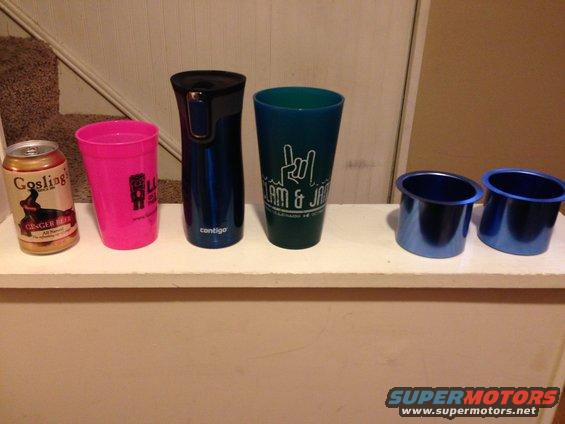 Ordered 2 cup holders on Amazon.  Wanted something to hold all sizes of drinks.  Here's the cup holder link.

http://www.amazon.com/gp/product/B0014K3KC0/ref=oh_aui_detailpage_o00_s01?ie=UTF8&psc=1