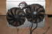 1995 Ford Bronco - This image shows a pair of electric cooling fans wired together, mounted on a metal enclosure.