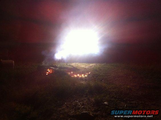 Bonfire at night with bright light and smoke