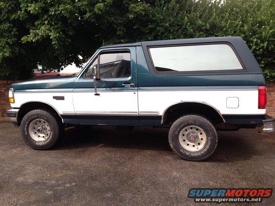 Side view of a 1994 Ford Bronco, two-tone green and white