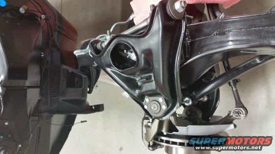 Black front suspension component with disc brake assembly