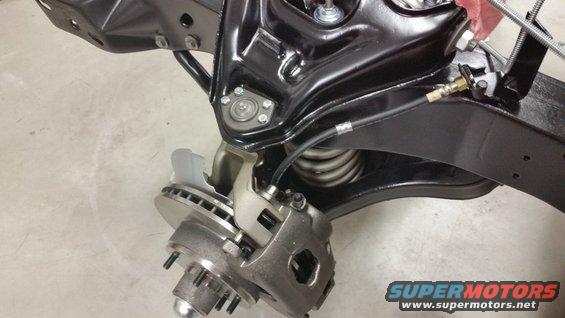 Front suspension assembly with brake rotor and caliper