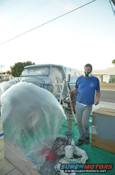 1979 Ford Bronco being prepped for paint, covered in plastic wrap