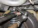 1988 Ford Bronco - Undercarriage view shows steering linkage and coil spring assembly.