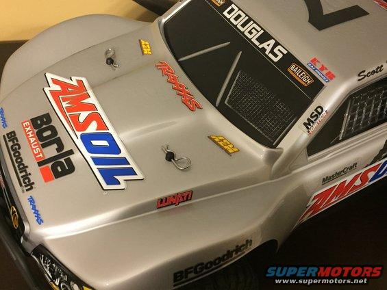 Silver remote control truck body with AMSOIL, Borla, Traxxas, and BFGoodrich decals