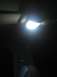 1988 Ford Bronco - The interior dome light is illuminated, creating bright light and dark shadows within the vehicle cabin.