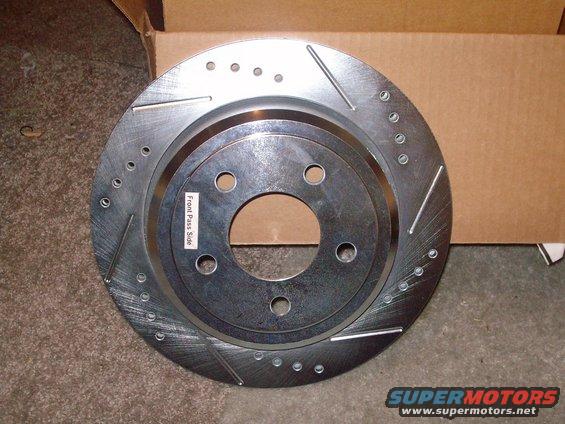 Slotted brake rotor labeled 'Front Pass Side'