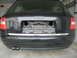 2003 Audi A6 - Rear view of a 2003 Audi A6 wagon, showing the exhaust and the area where the license plate would be mounted.