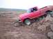 1976 Ford F-100 - 1976 Ford F-100 navigating a challenging rocky obstacle course.
