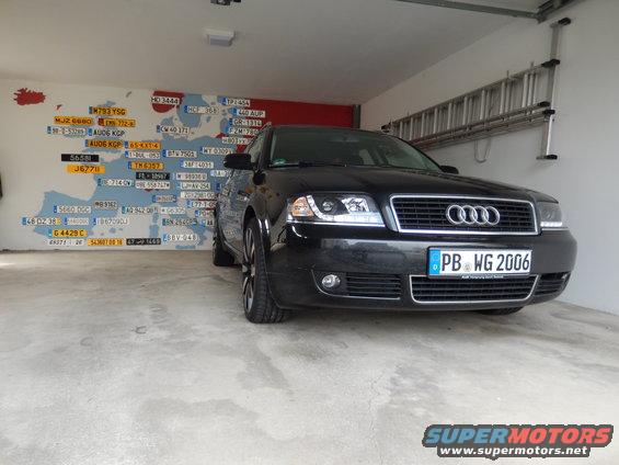 Front view of a black 2003 Audi A6 sedan with license plate PB WG 2006