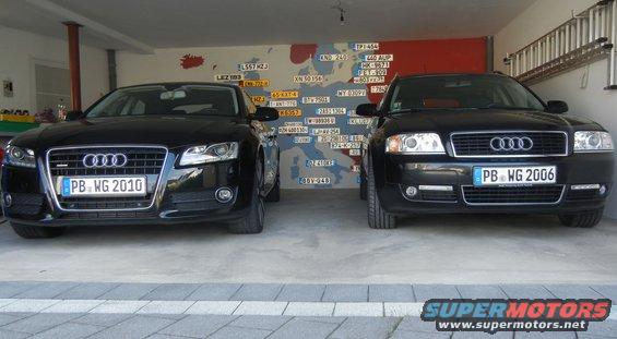 Front view of a black Audi with license plate PB WG 2010