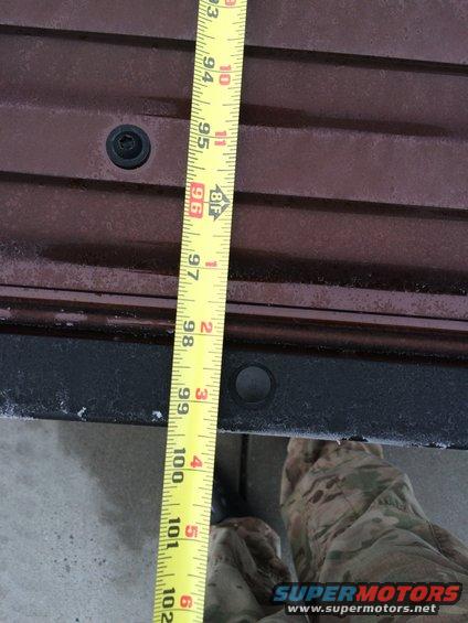 measuring tape on brown truck bed