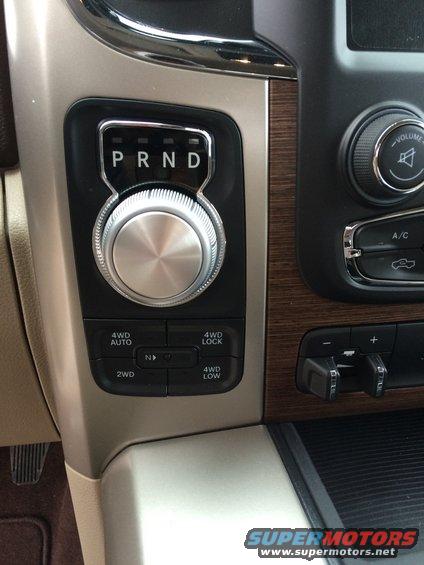 Rotary shifter and 4WD controls in a 2015 Dodge 1500 interior