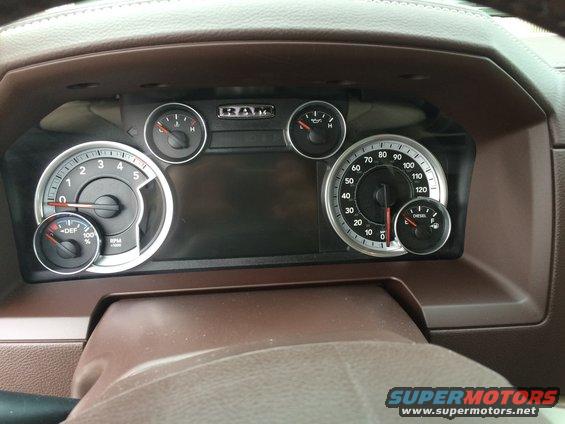 Ram truck dashboard with speedometer, tachometer, and other gauges visible