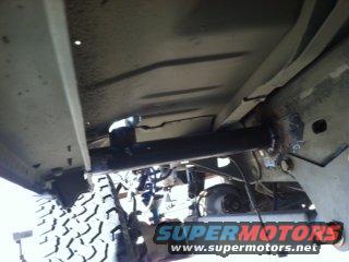 Undercarriage view of a vehicle with Supermotors watermark