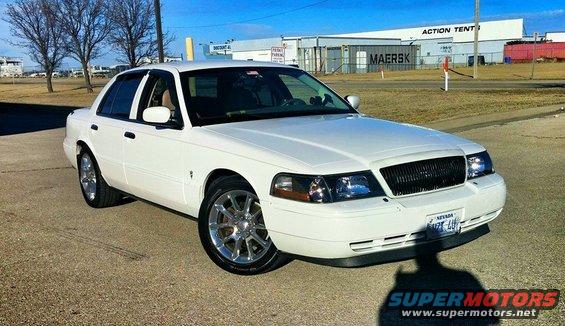 White 2000 Mercury Grand Marquis, 3/4 front view