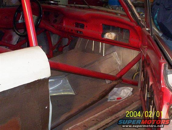 1963 Ford Falcon interior, red roll cage, dashboard