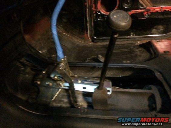 Transmission shifter and linkage inside a vehicle