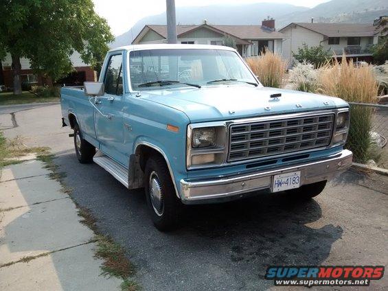 Blue 1980 Ford F-150 pickup truck, 3q-front view