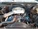1980 Ford F-150 - Engine bay details showing air cleaner assembly and distributor cap.