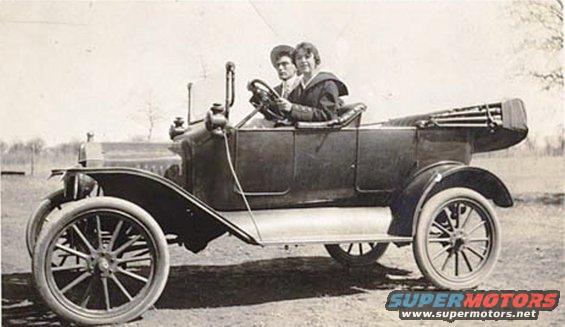 1915 Ford Model T touring car with two occupants