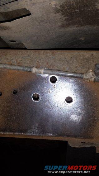 Passenger side rear holes drilled and hit with the sander.