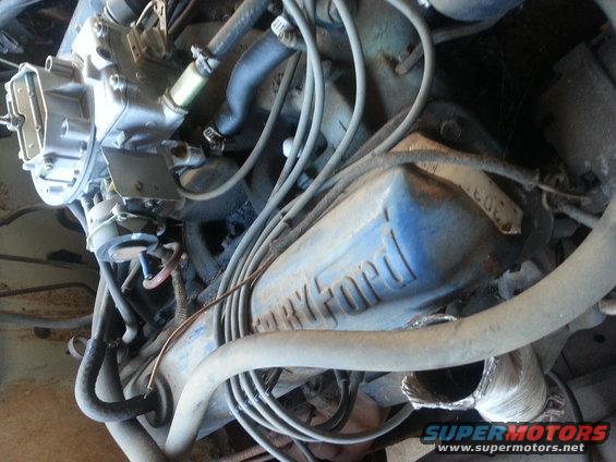 Blue Ford engine valve cover with 302 badge. 1973 Ford F-100