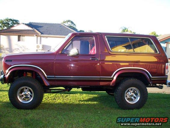 Maroon 1985 Ford Bronco side view