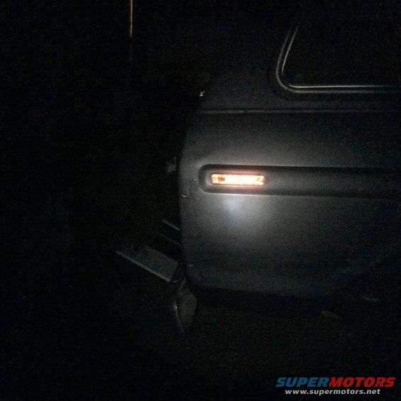 close-up of a vehicle's illuminated side marker light