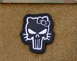 1990 Max II - A patch combining Hello Kitty and a skull motif is shown against a textured background.