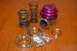 2007 Mazda 6 - A collection of performance automotive parts, including a blow-off valve and various springs, are laid out on a wooden surface.